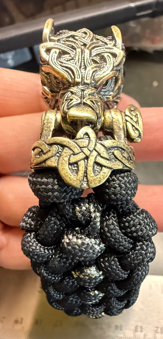 7 1/2 inches sanctified covenant paracord bracelet with a brass wolf buckle