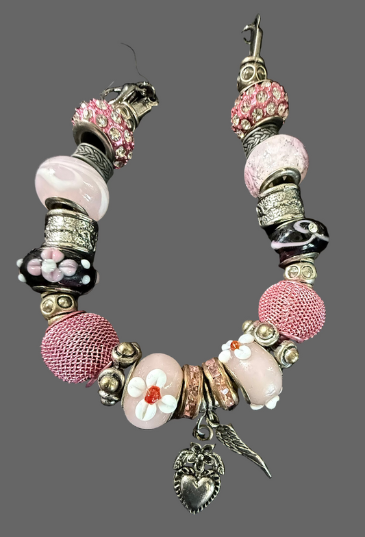 pink and black charm bracelet